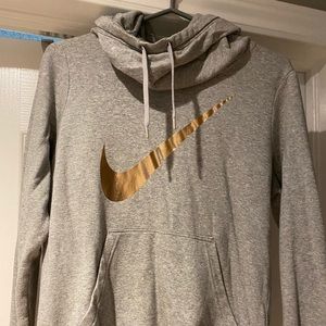 Women’s rose gold swoosh Nike hoodie
